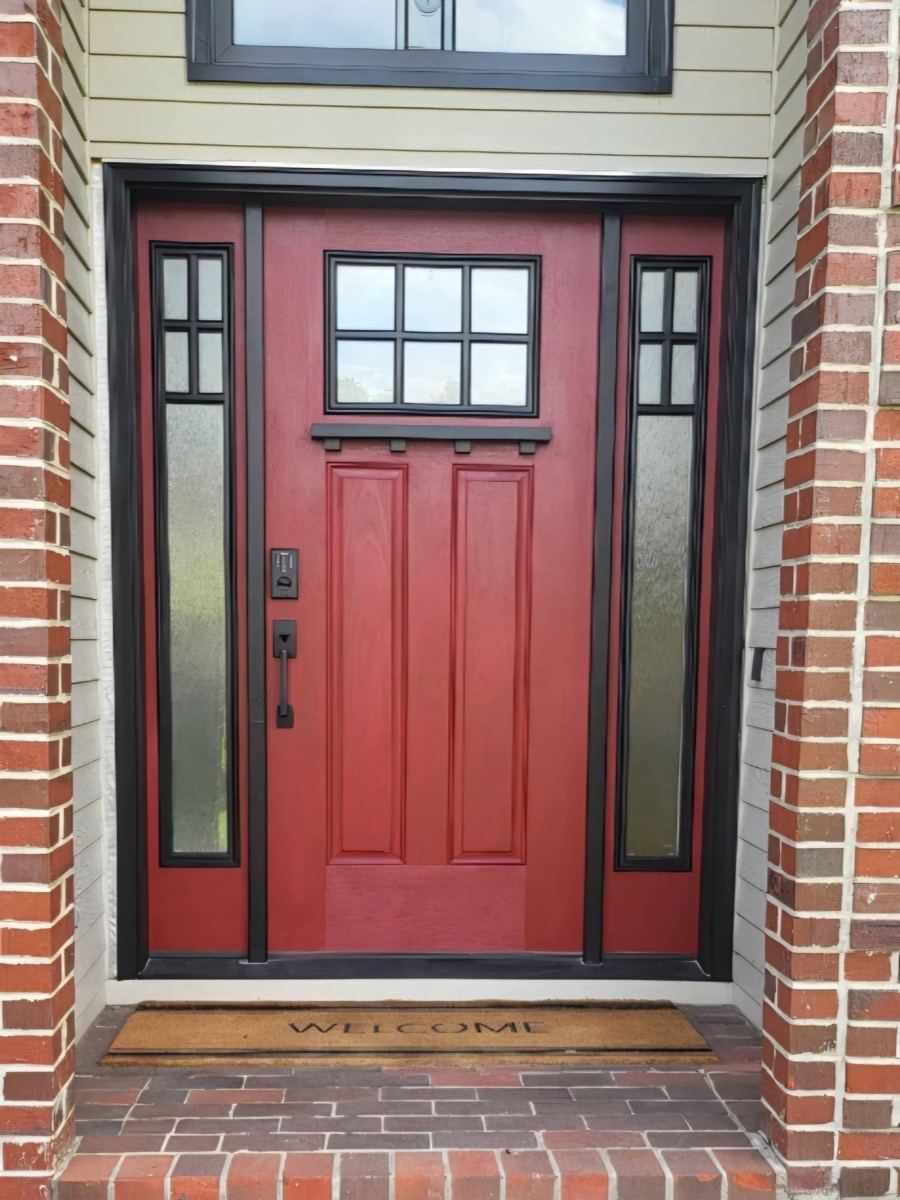 Same craftsman door painted bold red with black trim
