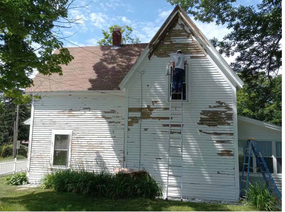 White house peeling badly before
