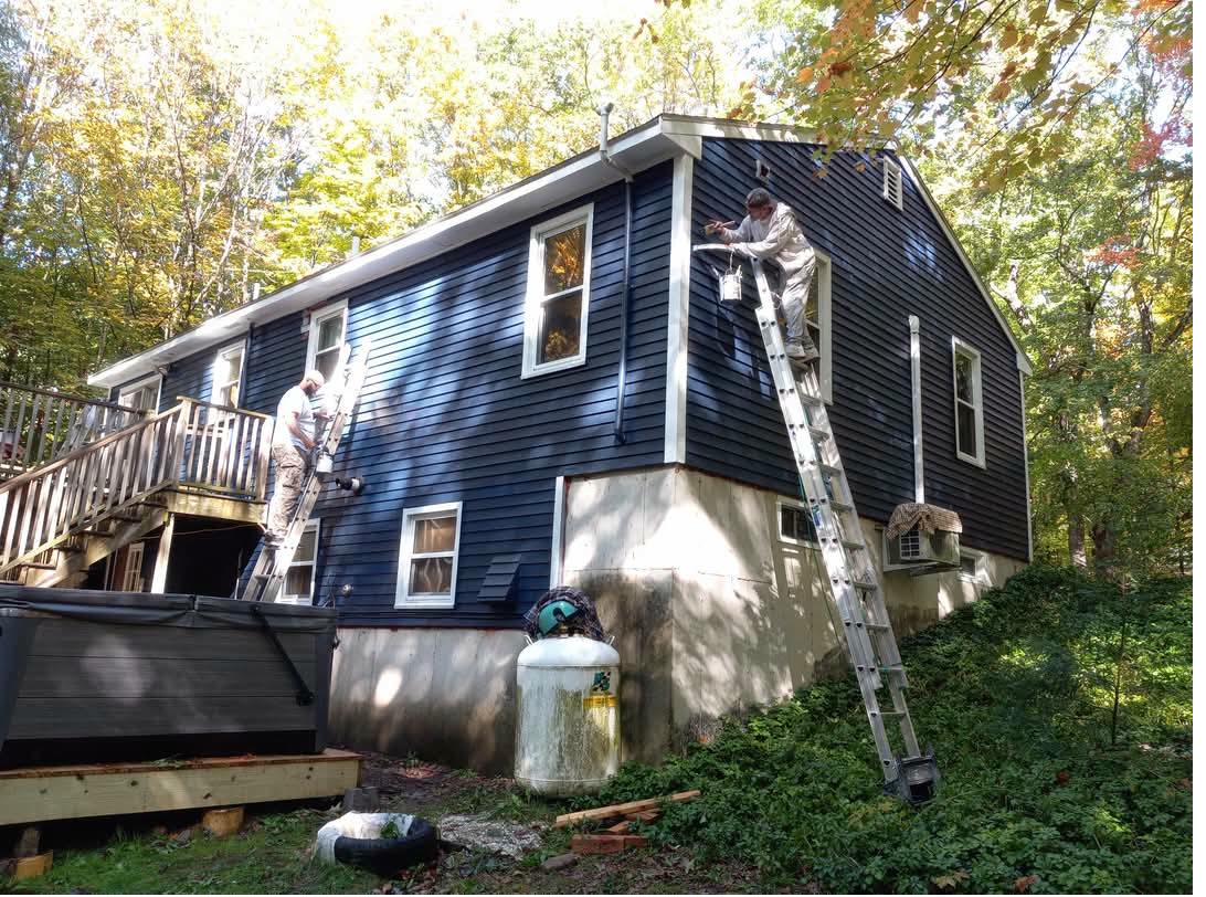 Navy blue house crew painting after