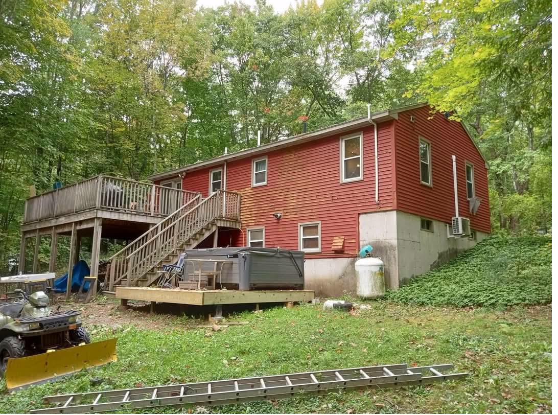 Faded red house before